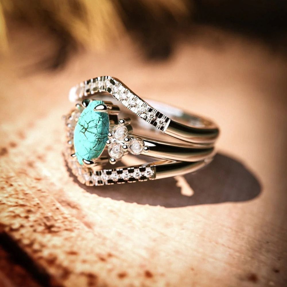 OCEAN'S EMBRACE RING