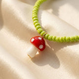 BEADED MUSHROOM NECKLACE