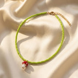 BEADED MUSHROOM NECKLACE