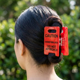 CAUTION CLAW CLIP